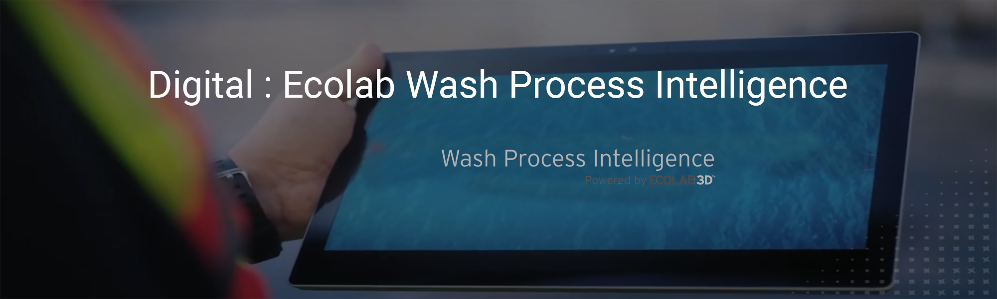 a man holding an ipad