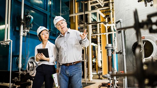 Ecolab team member working on 3D Trasar unit in power plant