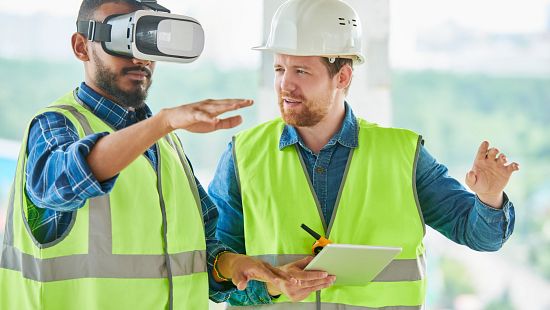 Two manufacturing associates using VR tech